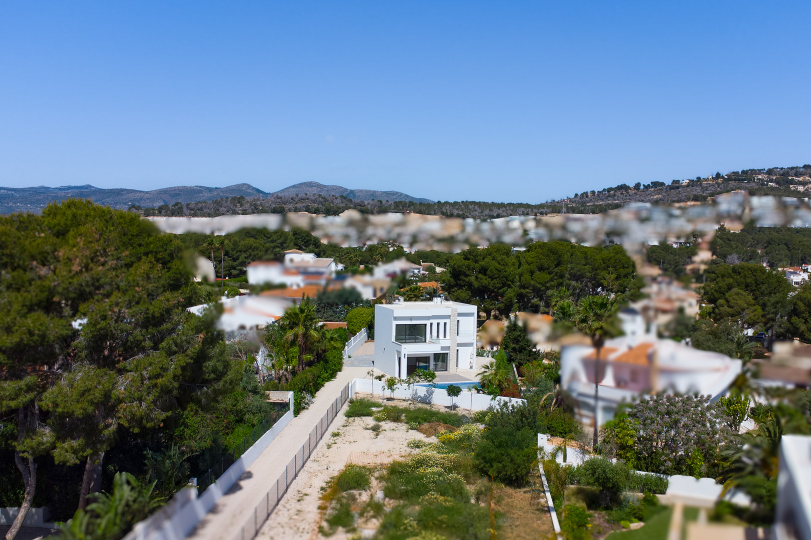 4644BEN Nieuwbouw villa met zeezicht op vlak grondstuk van 1715 m2 te koop in La Fustera, Benissa
