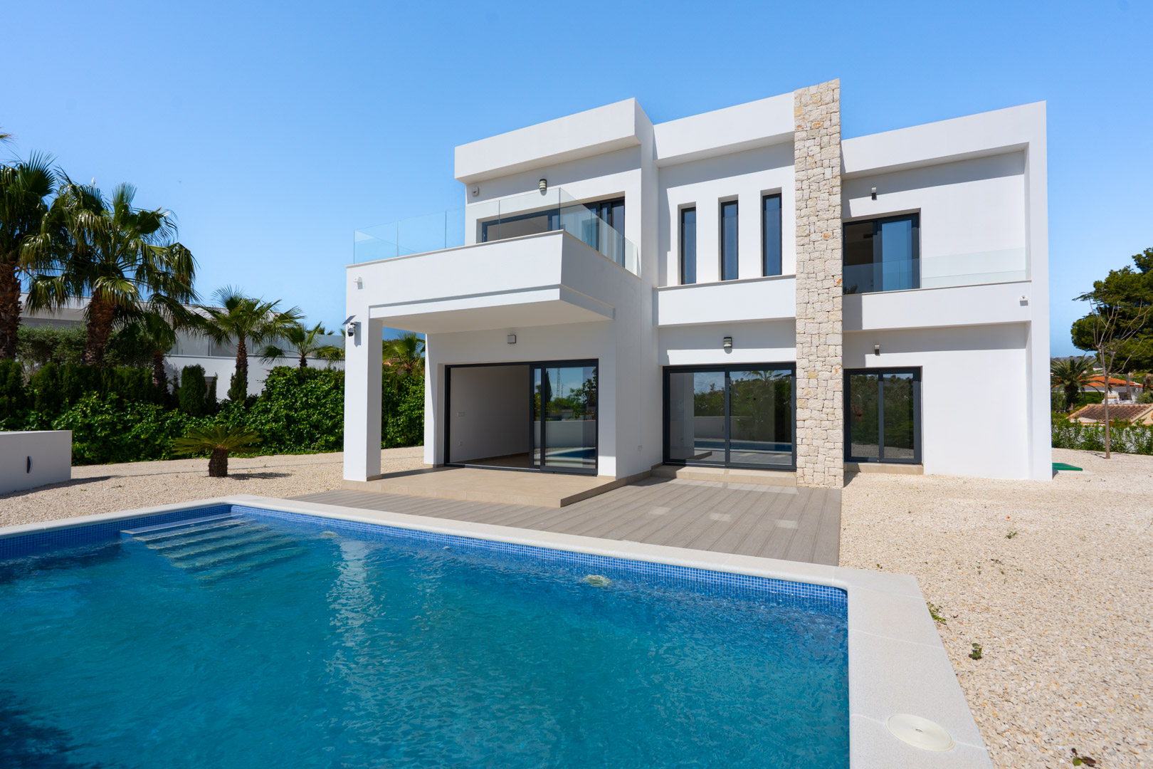 4644BEN Nieuwbouw villa met zeezicht op vlak grondstuk van 1715 m2 te koop in La Fustera, Benissa