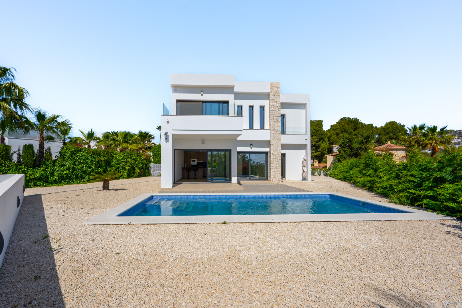 4644BEN Nieuwbouw villa met zeezicht op vlak grondstuk van 1715 m2 te koop in La Fustera, Benissa