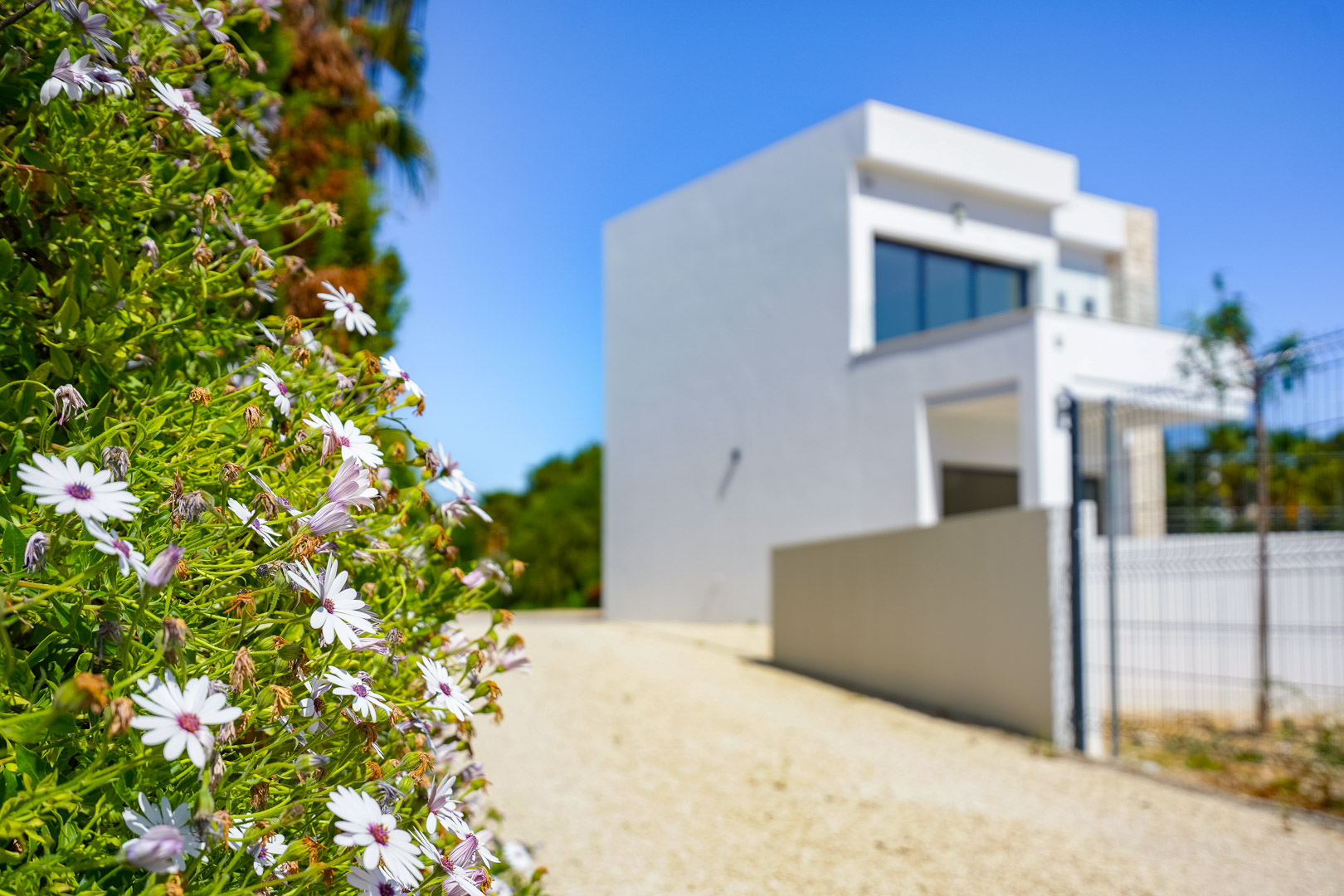 4644BEN Nieuwbouw villa met zeezicht op vlak grondstuk van 1715 m2 te koop in La Fustera, Benissa