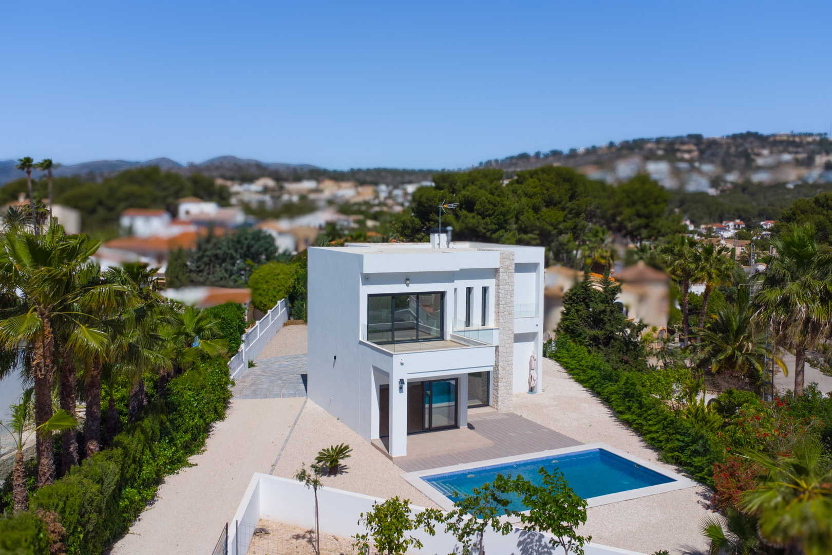 4644BEN Nieuwbouw villa met zeezicht op vlak grondstuk van 1715 m2 te koop in La Fustera, Benissa